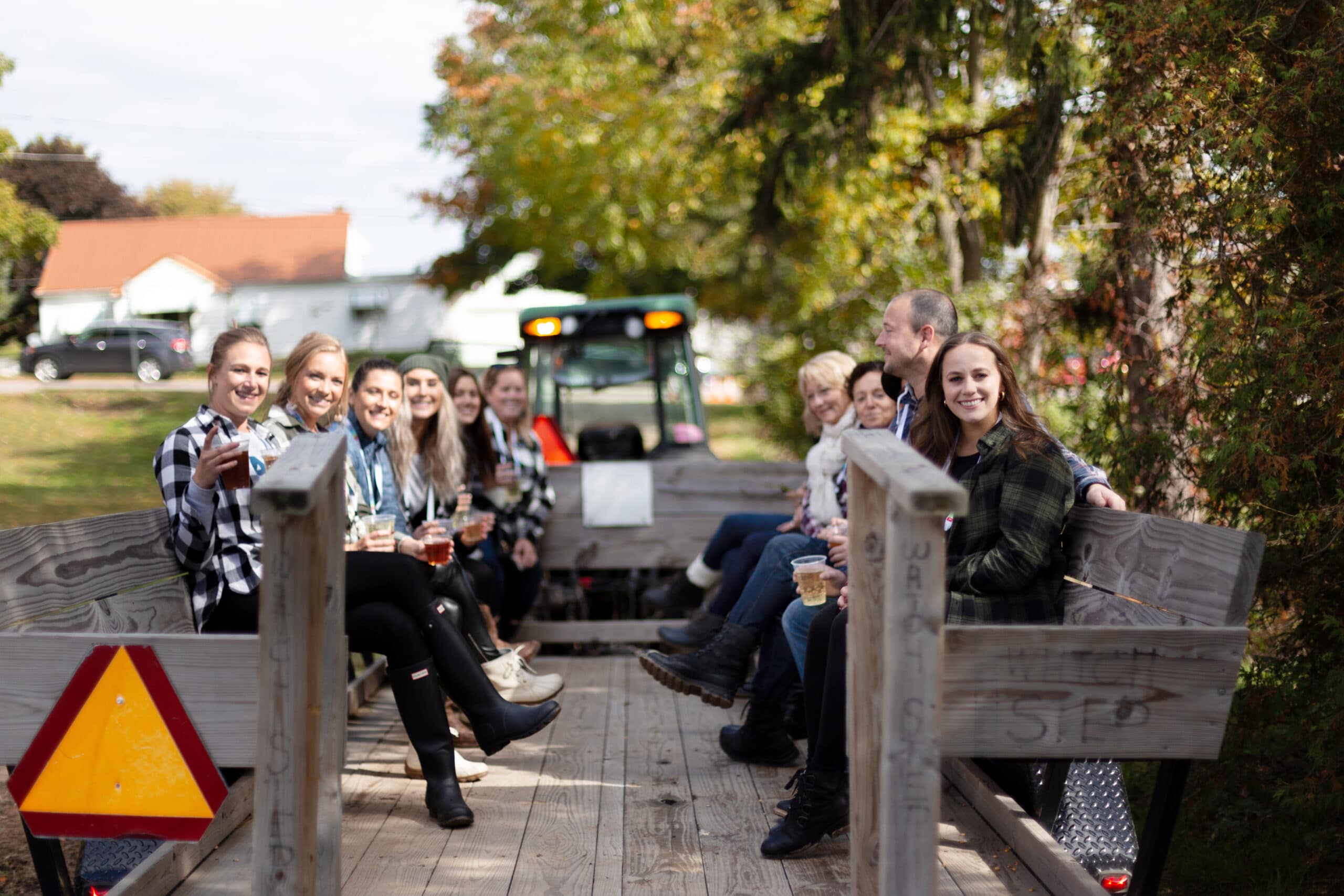 Treadstone employees enjoying a tractor ride and other Fall activities in Grand Rapids.